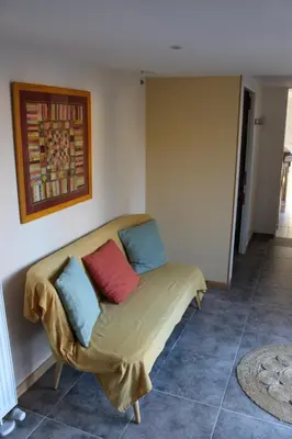 Coin salon dans l'établissement Chambre Swingy - Gîte les Zazous