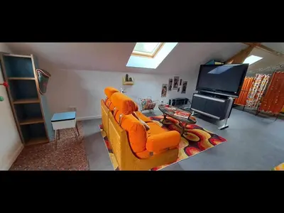 Télévision ou salle de divertissement dans l'établissement Le Vin-Tage