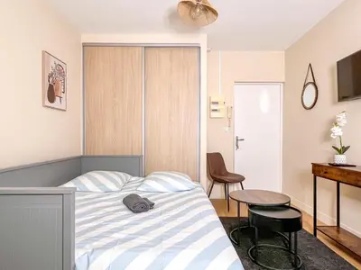 Un ou plusieurs lits dans un hébergement de l'établissement Le pédestre - Appartement cosy hyper centre-ville de DIJON