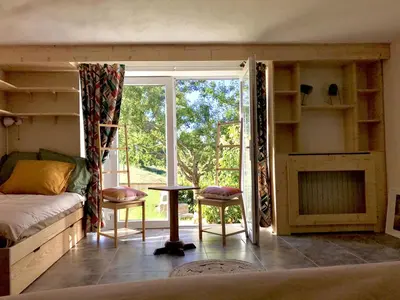 Coin salon dans l'établissement Chambre Jazzy - Gîte les Zazous