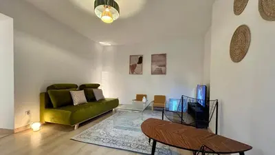 Coin salon dans l'établissement Les suites de Saint-Yves
