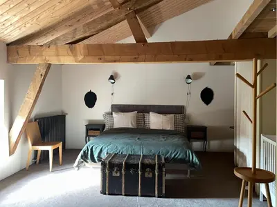 Un ou plusieurs lits dans un hébergement de l'établissement Gîte Le Clos de Miribel