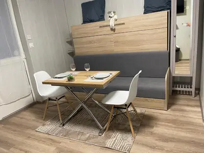 Coin salon dans l'établissement Chambre d'Hôte de l'Etang
