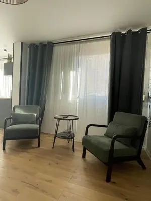 Coin salon dans l'établissement Le Pinot - Centre-ville - Gare à 5 mn