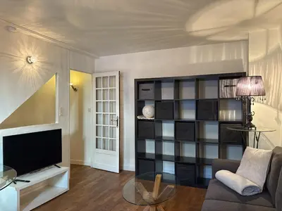 Télévision ou salle de divertissement dans l'établissement Maison Beauté