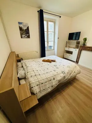 Un ou plusieurs lits dans un hébergement de l'établissement Lons City Studio