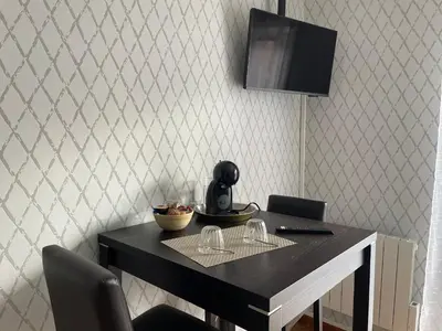 Télévision ou salle de divertissement dans l'établissement Chambre d'hôtes de l'Angeline