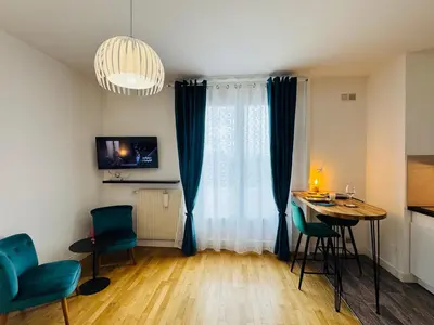 Télévision ou salle de divertissement dans l'établissement Centre-ville, parking facile,confortable