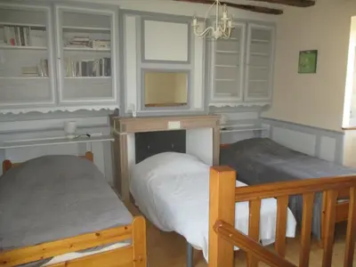 Un ou plusieurs lits dans un hébergement de l'établissement Le gîte de la Petite Résie