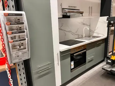 Cuisine ou kitchenette dans l'établissement Au petit prince