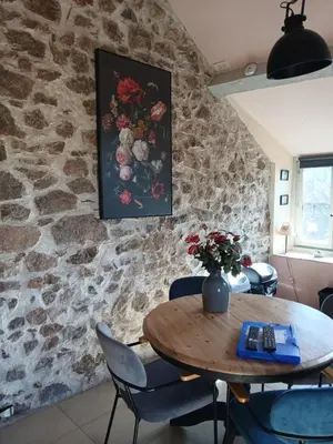 Coin salon dans l'établissement Gite de hermitage