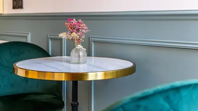 Coin salon dans l'établissement Suite Junior - l'Écrin des Vignes - Dijon Centre Historique