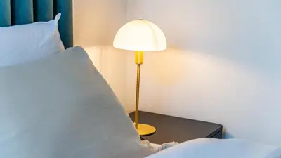 Un ou plusieurs lits dans un hébergement de l'établissement Suite Junior - l'Écrin des Vignes - Dijon Centre Historique