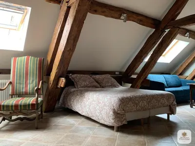 Coin salon dans l'établissement Algranate - Maison du Tisserand