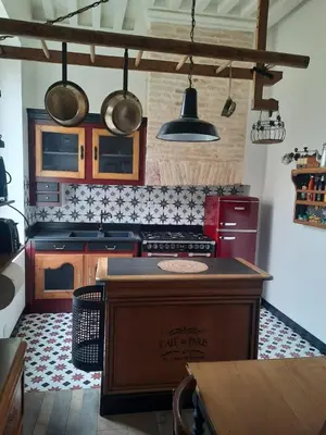 Cuisine ou kitchenette dans l'établissement La belle époque