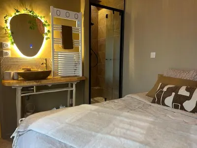 Un ou plusieurs lits dans un hébergement de l'établissement LE COTTAGE, T2, Hyper center, Terrasse