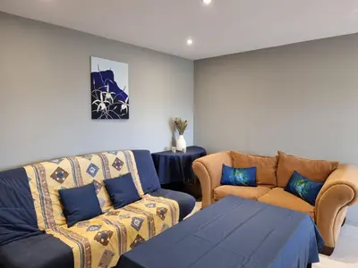 Coin salon dans l'établissement Appartement au cœur des vignes