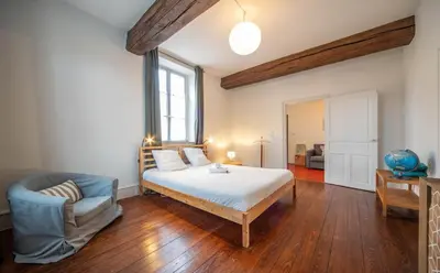 Un ou plusieurs lits dans un hébergement de l'établissement L'appartement Cosy