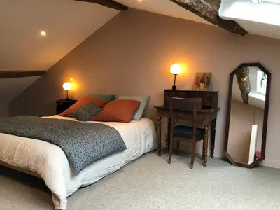 Un ou plusieurs lits dans un hébergement de l'établissement Maison d'Alice - Centre-ville de Cluny avec parking