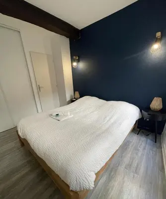 Un ou plusieurs lits dans un hébergement de l'établissement La Pause Cosy