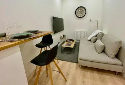 Coin salon dans l'établissement La Chouette Blanche, hypercentre