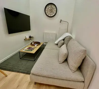 Télévision ou salle de divertissement dans l'établissement La Chouette Blanche, hypercentre