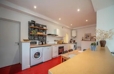 Cuisine ou kitchenette dans l'établissement Le refuge citadin