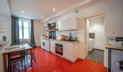 Cuisine ou kitchenette dans l'établissement Le refuge citadin