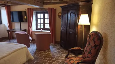Un ou plusieurs lits dans un hébergement de l'établissement Gite, chambre d hôte L échoppe est belle