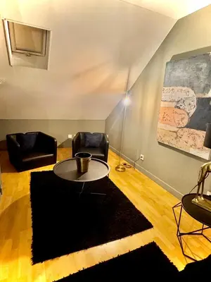 Coin salon dans l'établissement Le kozy