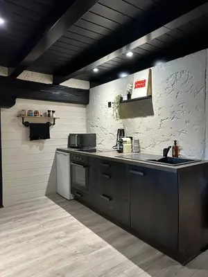 Cuisine ou kitchenette dans l'établissement Les Secrets du Moulin