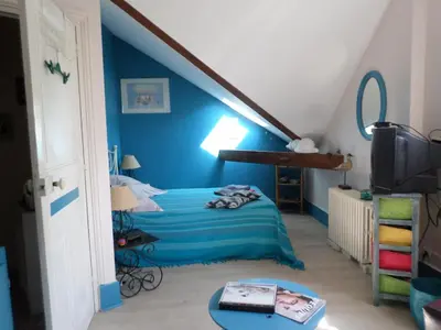 Un ou plusieurs lits dans un hébergement de l'établissement Maison patio et piscine