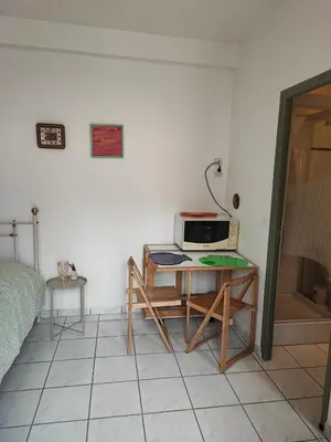 Télévision ou salle de divertissement dans l'établissement La casa verde