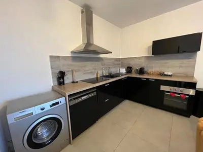 Cuisine ou kitchenette dans l'établissement Cinema et Billiard