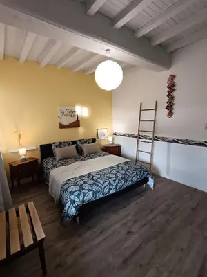 Un ou plusieurs lits dans un hébergement de l'établissement Chambre d'hôte la Chanée