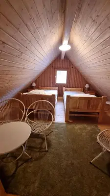 Coin salon dans l'établissement Le Nid du Lac
