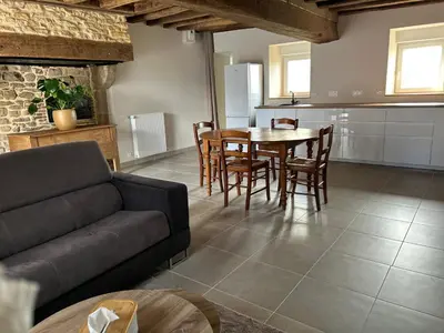 Coin salon dans l'établissement Maison de campagne rénovée