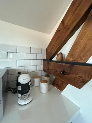Cuisine ou kitchenette dans l'établissement Appartement type T2 Il Giardino Sospeso