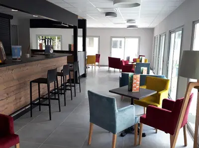 Coin salon dans l'établissement VVF Bourgogne Auxois Morvan