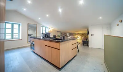 Cuisine ou kitchenette dans l'établissement L'exploratrice