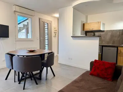 Cuisine ou kitchenette dans l'établissement Le Bacquin 21