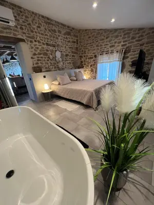 Un ou plusieurs lits dans un hébergement de l'établissement La Fermette de Nuit