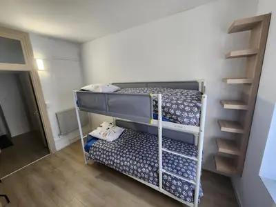 Un ou plusieurs lits dans un hébergement de l'établissement Le cocon de Charlotte