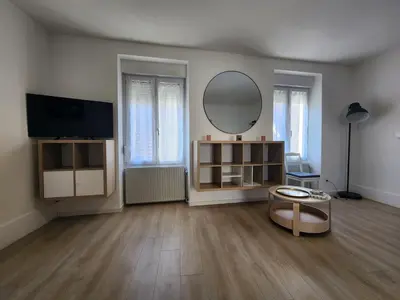 Télévision ou salle de divertissement dans l'établissement Le cocon de Charlotte