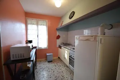 Cuisine ou kitchenette dans l'établissement Le jardin caché, maison indépendante classée 3 étoiles