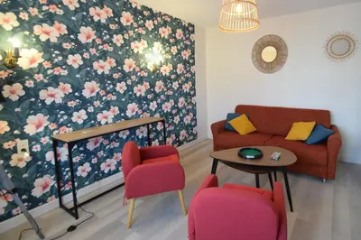 Coin salon dans l'établissement Le jardin caché, maison indépendante classée 3 étoiles
