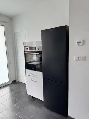 Cuisine ou kitchenette dans l'établissement Petite maison cosy avec jardin