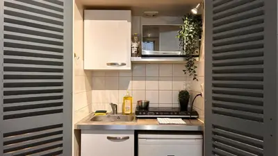 Cuisine ou kitchenette dans l'établissement L'Unique Central - Gare