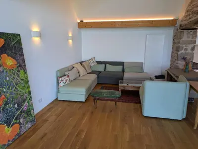 Coin salon dans l'établissement Gîte Les Marions
