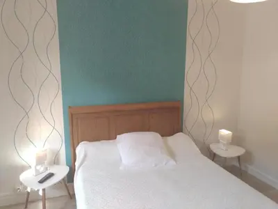 Un ou plusieurs lits dans un hébergement de l'établissement Auberge du vieux moulin le breuil